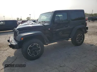 2015 Jeep Wrangler Rubicon Hard Rock z VIN 1C4BJWCG9FL714606, wystawiony jako Copart lot #68521014 z przebiegiem 35 187 mil mil oraz Szkoda całkowita • Salvage title. Historia ofert i sprzedaży dostępna na DreamBid. Obrazek 1.