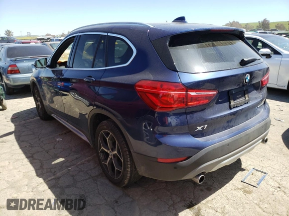 2018 BMW X1 sDrive28i with VIN WBXHU7C33J5L06428, listed as a Copart auction lot 48210333 with 33,965 mi miles and . Bid and sale history available at DreamBid. Image 2.
