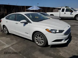 2017 Ford Fusion Hybrid SE z VIN 3FA6P0LU2HR209228, wystawiony jako Copart lot #62518055 z przebiegiem 119 174 mil mil oraz Szkoda całkowita • Salvage title. Historia ofert i sprzedaży dostępna na DreamBid. Obrazek 4.