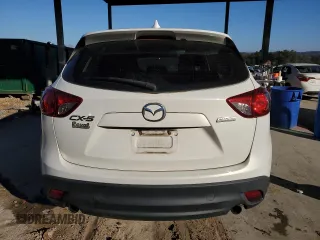 2014 Mazda CX-5 Sport with VIN JM3KE2BEXE0332590, listed as a Copart auction lot 87534365 with Not Provided miles and Salvage Title. Bid and sale history available at carsss.com. Image 6.