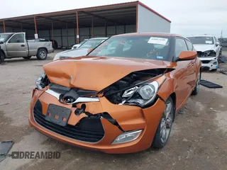 2016 Hyundai Veloster with VIN KMHTC6AD8GU301106, listed as a IAAI auction lot 41067109 with 139,002 mi miles. Bid and sale history available at carsss.com. Image 2.