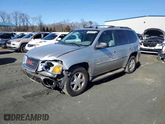 2006 GMC Envoy SLT with VIN 1GKDS13S362362176, listed as a Copart auction lot 43038795 with 180,279 mi miles and Salvage Title. Bid and sale history available at carsss.com. Image 1.