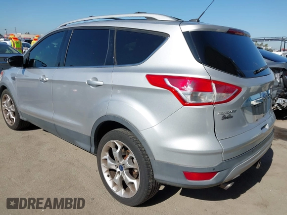 2015 Ford Escape Titanium with VIN 1FMCU0J90FUA43720, listed as a IAAI auction lot 42541048 with 98,948 mi miles and . Bid and sale history available at DreamBid. Image 3.