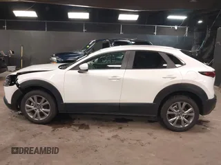 2024 Mazda CX-30 S Carbon Edition z VIN 3MVDMBCM4RM657165, wystawiony jako IAAI lot #42297738 z przebiegiem 7 041 mil mil oraz . Historia ofert i sprzedaży dostępna na DreamBid. Obrazek 15.