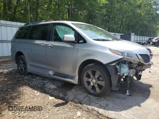 2015 Toyota Sienna SE with VIN 5TDXK3DCXFS580975, listed as a Copart auction lot 56309505 with 154,073 mi miles and Salvage title. Bid and sale history available at DreamBid. Image 4.