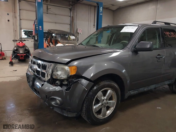 2011 Ford Escape XLT with VIN 1FMCU9D73BKB81871, listed as a IAAI auction lot 39857267 with 75,273 mi miles. Bid and sale history available at carsss.com. Image 6.