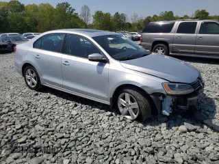 2012 Volkswagen Jetta TDI w/Premium & Nav с VIN 3VWLL7AJ4CM426910, выставлен на аукционе Copart как лот 53111065 с пробегом 137 376 миль миль и Списание • Salvage title. История ставок и продаж доступна на DreamBid. Изображение 4.