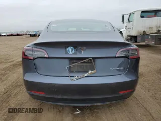 2021 Tesla Model 3 Long Range with VIN 5YJ3E1EB2MF852663, listed as a Copart auction lot 54726615 with 29,215 mi miles and Clean Title. Bid and sale history available at carsss.com. Image 6.