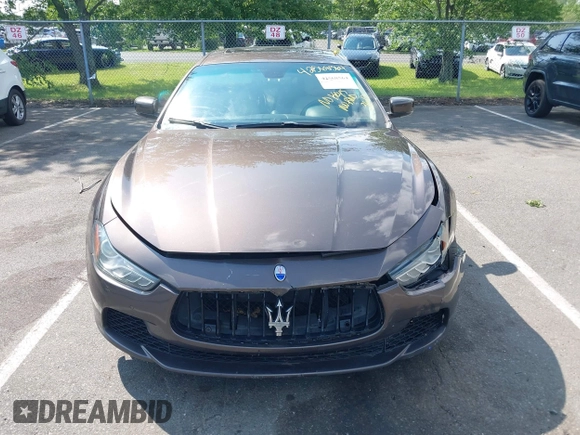 2015 Maserati Ghibli S Q4 with VIN ZAM57RTA7F1154097, listed as a IAAI auction lot 42568564 with 113,436 mi miles and . Bid and sale history available at DreamBid. Image 6.