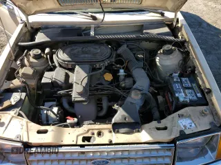 1983 Ford Escort z VIN 2FABP1347DX161788, wystawiony jako Copart lot #76347694 z przebiegiem 58 514 mil mil oraz Szkody całkowita. Historia ofert i sprzedaży dostępna na DreamBid. Obrazek 11.
