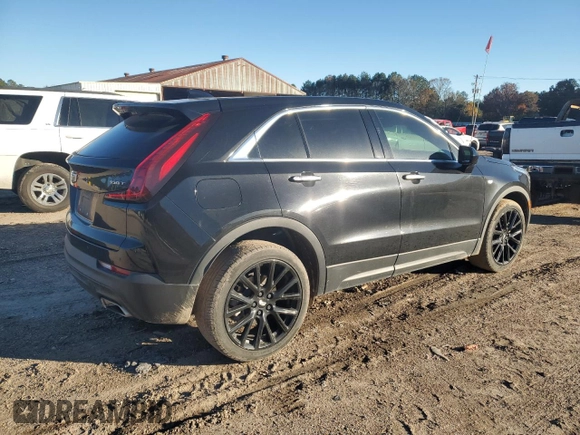 2021 Cadillac XT4 FWD Luxury с VIN 1GYAZAR4XMF066381, выставлен на аукционе Copart как лот 84615464 с пробегом 80 018 миль миль и Списание • Salvage title. История ставок и продаж доступна на DreamBid. Изображение 3.