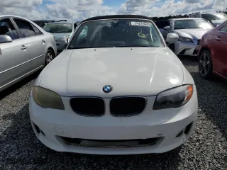 2012 BMW 1 Series 128i with VIN WBAUL7C54CVM83585, listed as a Copart auction lot 74215044 with 0 mi miles and Salvage Title. Bid and sale history available at carsss.com. Image 5.
