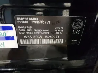 2018 BMW M5 z VIN WBSJF0C51JB282271, wystawiony jako Copart lot #60647265 z przebiegiem 63 765 mil mil oraz Szkoda całkowita • Salvage title. Historia ofert i sprzedaży dostępna na DreamBid. Obrazek 13.