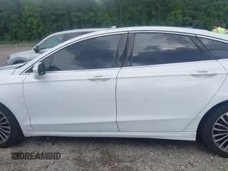 2017 Ford Fusion Titanium z VIN 3FA6P0K93HR203063, wystawiony jako IAAI lot #42243064 z przebiegiem 176 078 mil mil oraz . Historia ofert i sprzedaży dostępna na DreamBid. Obrazek 15.