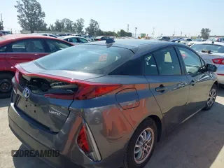 2021 Toyota Prius LE with VIN JTDKAMFP3M3167586, listed as a IAAI auction lot 39672661 with 42,050 mi miles and . Bid and sale history available at DreamBid. Image 4.