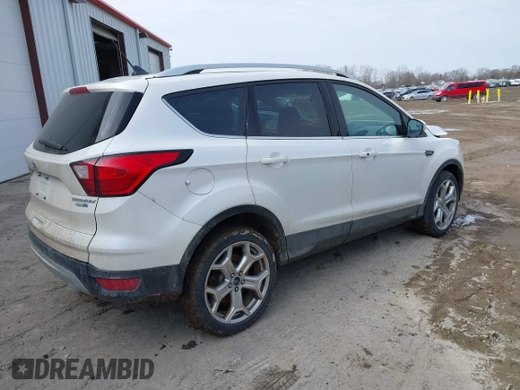 2019 Ford Escape Titanium with VIN 1FMCU9J97KUB85528, listed as a IAAI auction lot 41708344 with 88,841 mi miles. Bid and sale history available at carsss.com. Image 4.