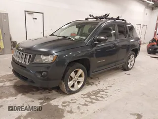 2016 Jeep Compass Sport with VIN 1C4NJCBA1GD559571, listed as a IAAI auction lot 41913639 with 175,038 mi miles. Bid and sale history available at carsss.com. Image 2.