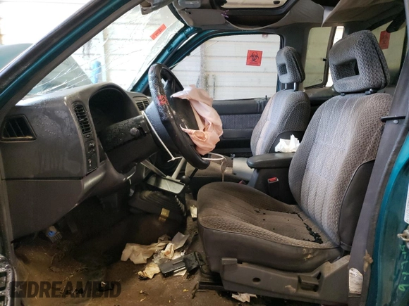 1997 Nissan Frontier XE with VIN 1N6SD16Y2VC338776, listed as a Copart auction lot 45020595 with 243,030 mi miles and Salvage title. Bid and sale history available at DreamBid. Image 7.
