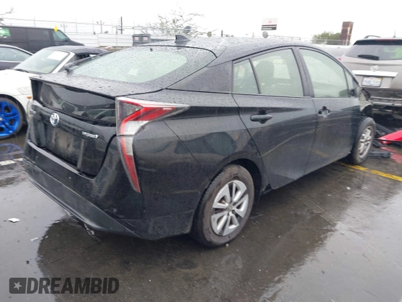 2017 Toyota Prius Two with VIN JTDKARFU8H3051986, listed as a IAAI auction lot 41579576 with 287,322 mi miles. Bid and sale history available at carsss.com. Image 4.
