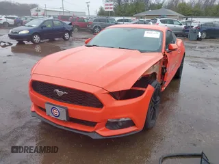 2016 Ford Mustang EcoBoost with VIN 1FA6P8TH8G5266228, listed as a IAAI auction lot 41823278 with 104,595 mi miles and . Bid and sale history available at DreamBid. Image 2.