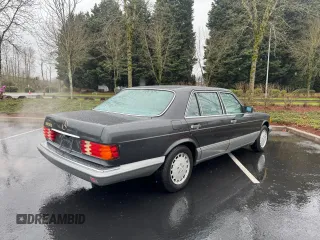 1988 Mercedes-Benz 560 with VIN WDBCA39D1JA406073, listed as a Copart auction lot 50398345 with 111,524 mi miles and Clean Title. Bid and sale history available at DreamBid. Image 4.