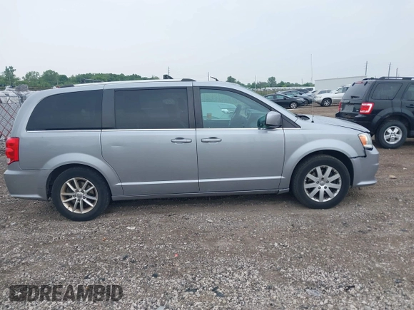 2018 Dodge Grand Caravan SXT z VIN 2C4RDGCG7JR301434, wystawiony jako IAAI lot #42510771 z przebiegiem 270 524 mil mil oraz . Historia ofert i sprzedaży dostępna na DreamBid. Obrazek 13.