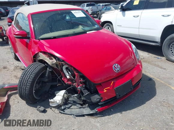 2015 Volkswagen Beetle 1.8T w/Tech with VIN 3VW517AT4FM803238, listed as a IAAI auction lot 41812373 with 42,369 mi miles and . Bid and sale history available at DreamBid. Image 6.