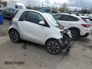 2017 Smart fortwo Pure with VIN WMEFJ5DA0HK176622, listed as a Copart auction lot 51644835 with 59,924 mi miles and Salvage Title. Bid and sale history available at DreamBid. Image 4.