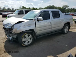 2014 Honda Ridgeline RTL with VIN 5FPYK1F57EB002835, listed as a Copart auction lot 54748905 with 111,253 mi miles and Salvage title. Bid and sale history available at DreamBid. Image 1.