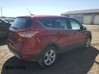 2016 Ford Escape SE z VIN 1FMCU9GX1GUA52213, wystawiony jako Copart lot #57137545 z przebiegiem 142 646 mil mil oraz Czysty tytuł • Clean title. Historia ofert i sprzedaży dostępna na DreamBid. Obrazek 3.