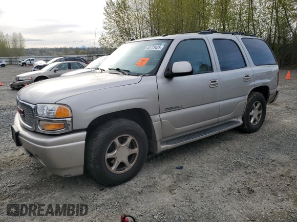 2005 GMC Yukon Denali z VIN 1GKEK63U65J262371, wystawiony jako Copart lot #52773425 z przebiegiem 129 028 mil mil oraz Czysty tytuł • Clean title. Historia ofert i sprzedaży dostępna na DreamBid. Obrazek 1.