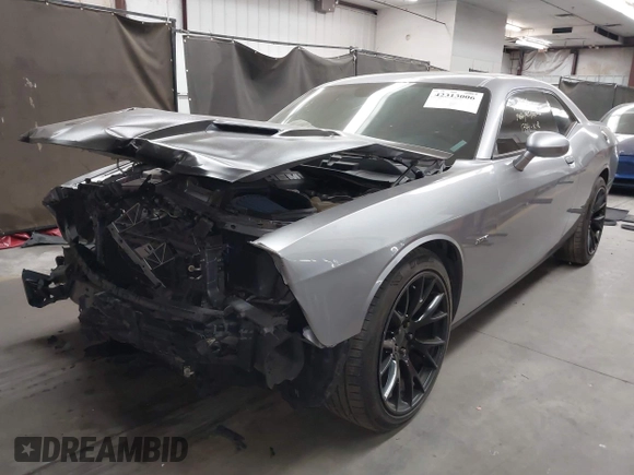 2016 Dodge Challenger R/T Plus с VIN 2C3CDZBT0GH311774, выставлен на аукционе IAAI как лот 42313006 с пробегом 85 905 миль миль и . История ставок и продаж доступна на DreamBid. Изображение 18.