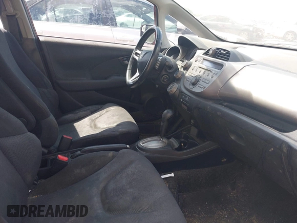 2011 Honda Fit Sport with VIN JHMGE8H50BC003110, listed as a IAAI auction lot 42210062 with 185,571 mi miles and . Bid and sale history available at DreamBid. Image 5.