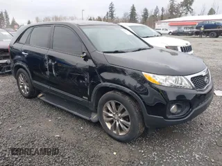 2011 Kia Sorento EX with VIN 5XYKUDA2XBG020502, listed as a IAAI auction lot 41826959 with 157,628 mi miles. Bid and sale history available at carsss.com. Image 1.