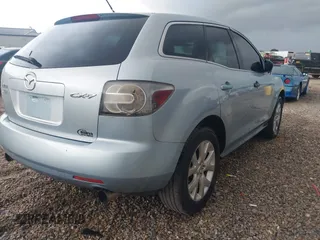 2007 Mazda CX-7 Sport z VIN JM3ER293770117080, wystawiony jako IAAI lot #42197144 z przebiegiem 161 754 mil mil oraz . Historia ofert i sprzedaży dostępna na DreamBid. Obrazek 4.