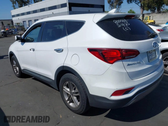 2017 Hyundai Santa Fe 2.4L z VIN 5XYZTDLB0HG403842, wystawiony jako IAAI lot #42206543 z przebiegiem 77 900 mil mil oraz . Historia ofert i sprzedaży dostępna na DreamBid. Obrazek 3.