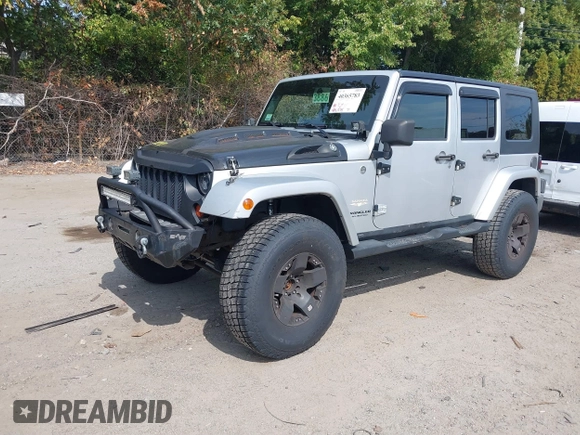 2008 Jeep Wrangler Unlimited Sahara with VIN 1J4GA59158L623784, listed as a IAAI auction lot 40365783 with 185,224 mi miles and . Bid and sale history available at DreamBid. Image 17.