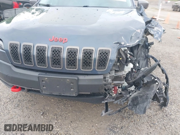 2019 Jeep Cherokee Trailhawk z VIN 1C4PJMBX1KD364100, wystawiony jako IAAI lot #42264518 z przebiegiem 117 020 mil mil oraz . Historia ofert i sprzedaży dostępna na DreamBid. Obrazek 17.