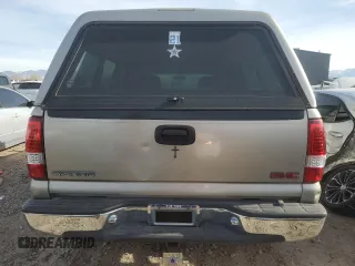 2000 GMC New Sierra 1500 SLE with VIN 2GTEK19T7Y1310097, listed as a Copart auction lot 84557764 with 257,060 mi miles and Salvage Title. Bid and sale history available at carsss.com. Image 6.