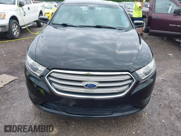 2015 Ford Taurus SEL z VIN 1FAHP2E81FG116032, wystawiony jako IAAI lot #42188269 z przebiegiem 178 774 mil mil oraz . Historia ofert i sprzedaży dostępna na DreamBid. Obrazek 12.