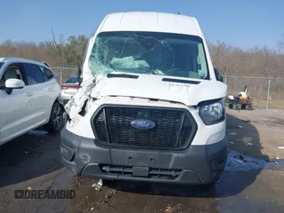 2022 Ford Transit Cargo with VIN 1FTBW3X81NKA04543, listed as a IAAI auction lot 41763336 with 128,518 mi miles. Bid and sale history available at carsss.com. Image 12.