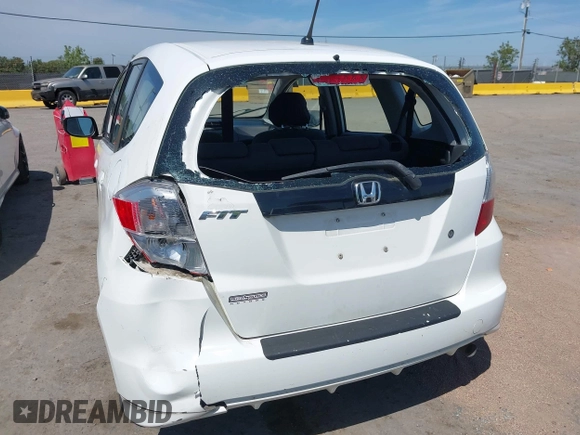 2009 Honda Fit z VIN JHMGE88239S045275, wystawiony jako IAAI lot #42142589 z przebiegiem 145 964 mil mil oraz . Historia ofert i sprzedaży dostępna na DreamBid. Obrazek 6.