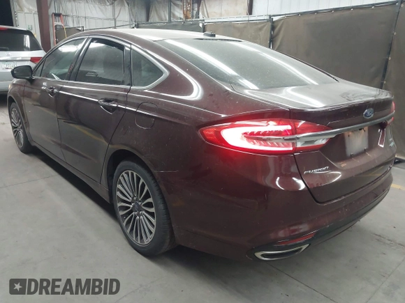 2017 Ford Fusion SE with VIN 3FA6P0H92HR105567, listed as a IAAI auction lot 42174324 with 123,443 mi miles and . Bid and sale history available at DreamBid. Image 3.