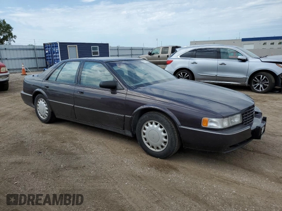 1992 Cadillac Seville z VIN 1G6KY53BXNU804126, wystawiony jako Copart lot #69219394 z przebiegiem 100 647 mil mil oraz Czysty tytuł • Clean title. Historia ofert i sprzedaży dostępna na DreamBid. Obrazek 4.