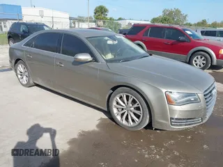 2012 Audi A8 L with VIN WAURVAFD3CN024063, listed as a IAAI auction lot 41706508 with 1 mi miles. Bid and sale history available at carsss.com. Image 1.