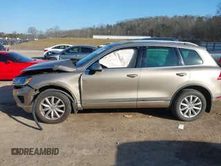 2016 Volkswagen Touareg Sport with VIN WVGEF9BP0GD003241, listed as a IAAI auction lot 41498797 with 90,141 mi miles and . Bid and sale history available at DreamBid. Image 14.