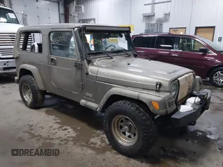 2006 Jeep Wrangler Unlimited LWB with VIN 1J4FA44S96P714309, listed as a IAAI auction lot 41252391 with 164,720 mi miles. Bid and sale history available at carsss.com. Image 1.