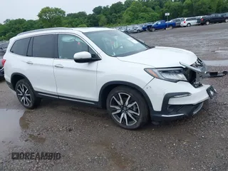 2022 Honda Pilot Elite with VIN 5FNYF6H06NB061838, listed as a IAAI auction lot 42461035 with 67,802 mi miles and . Bid and sale history available at DreamBid. Image 1.