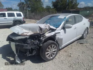 2015 Kia Optima EX with VIN 5XXGN4A71FG493648, listed as a IAAI auction lot 32483878 with Not provided miles and . Bid and sale history available at DreamBid. Image 2.