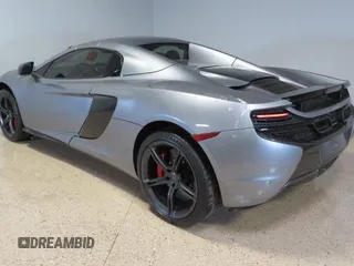 2016 McLaren 650S z VIN SBM11FAA1GW006061, wystawiony jako Copart lot #58605735 z przebiegiem 16 999 mil mil oraz Szkody całkowita. Historia ofert i sprzedaży dostępna na DreamBid. Obrazek 3.